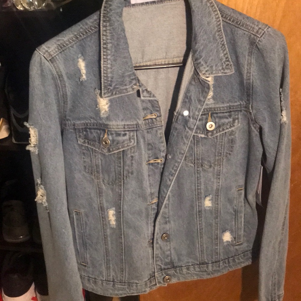 Distressed jean jacket